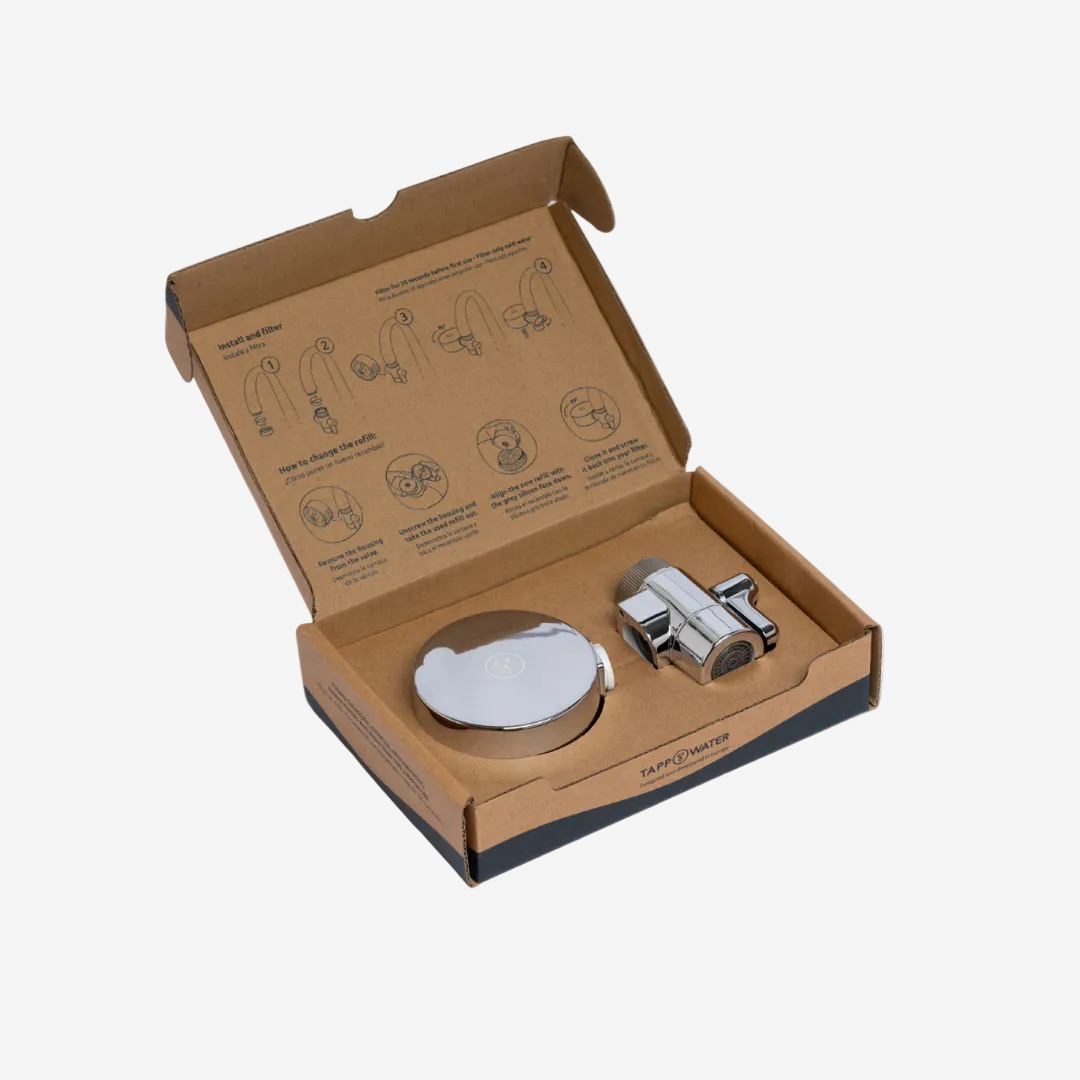 EcoPro Compact Starter Pack open box — chrome filter housing and diverter valve in kraft packaging with install instructions